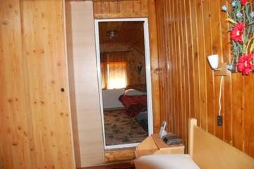 Фото номера Люкс с 2 спальнями Гостевой дом Pensiunea Doru de Muscel г. Coteneşti 12